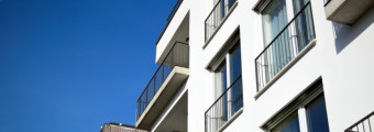 CITY APPROVES PLAN FOR MORE FLATS